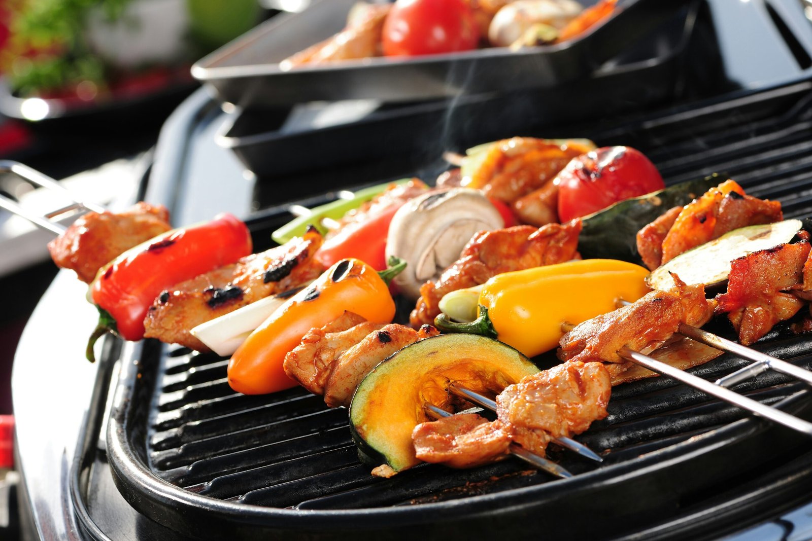 Grilling meat on hot BBQ grill